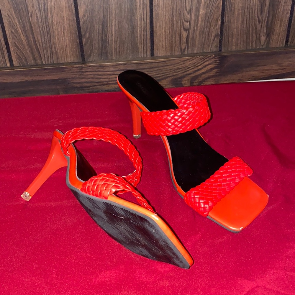 Ruby red heels, worn twice. Tiny scruffs at front of shoes.